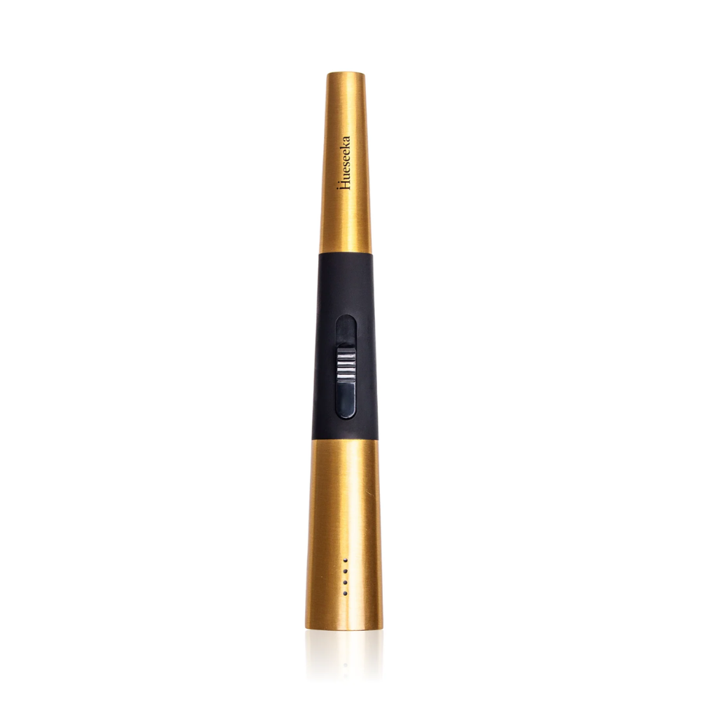 Gold and black rechargeable candle lighter on a white background