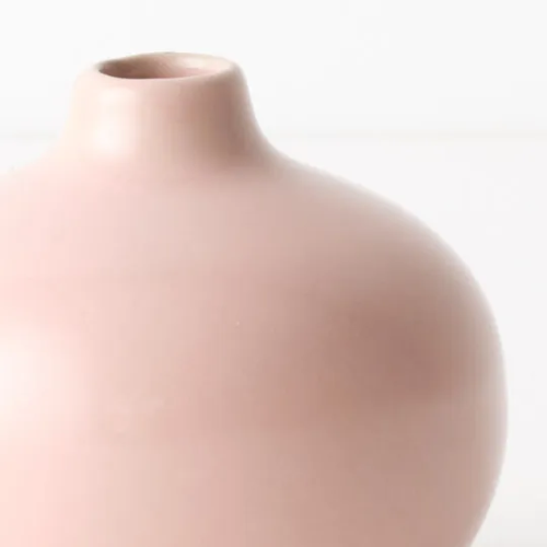 Close_Up_Of_Blush_Pink_Ceramic_Bud_Vase_white_background