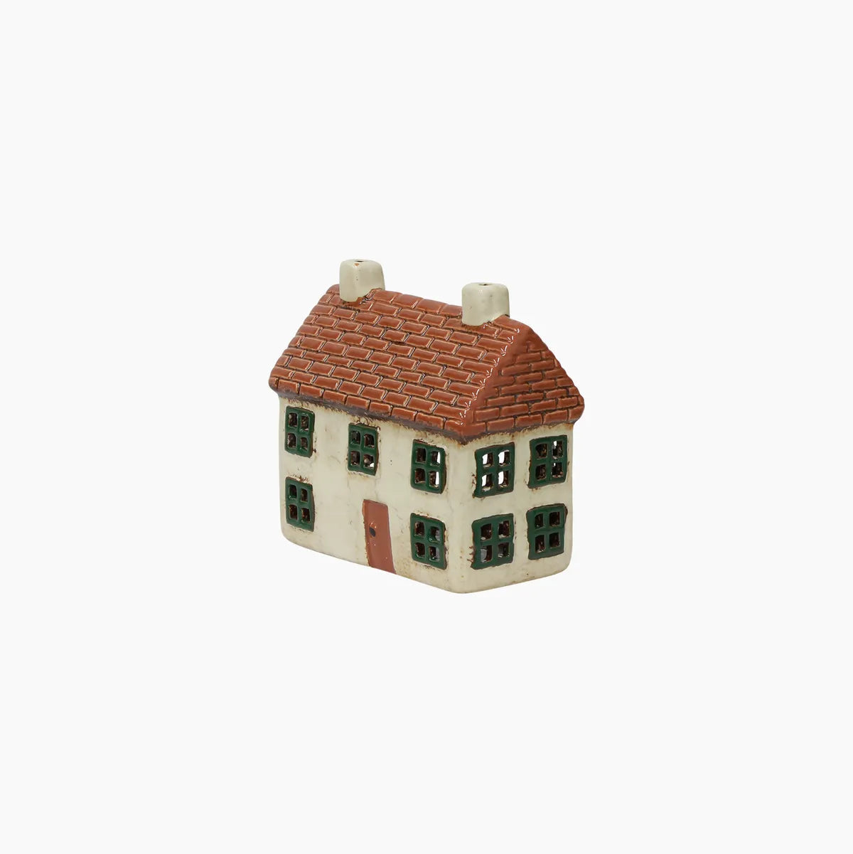 Small ceramic model of a house with a brown roof on a white background