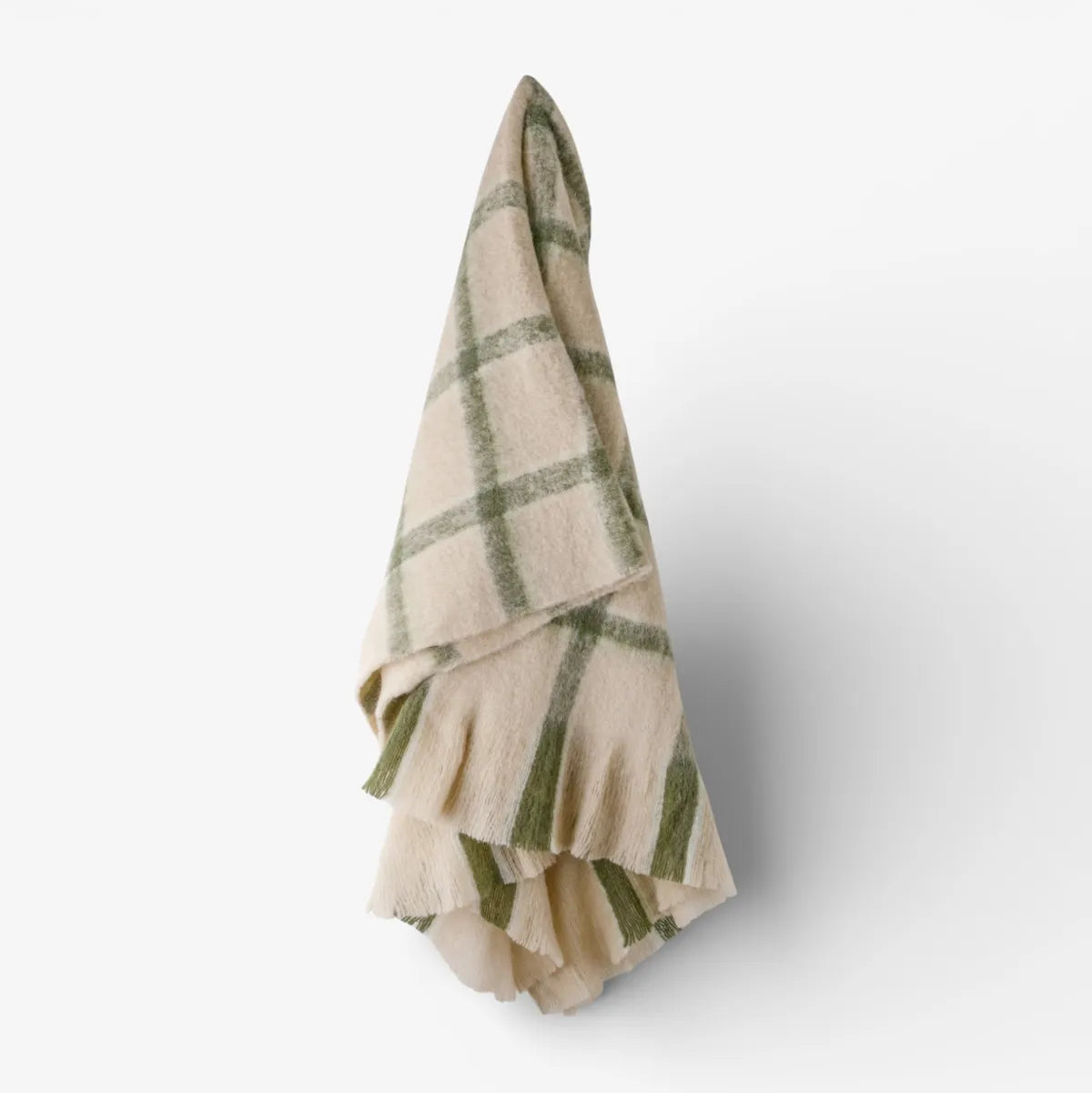 Green and beige check blanket with ruffled edge on a white background