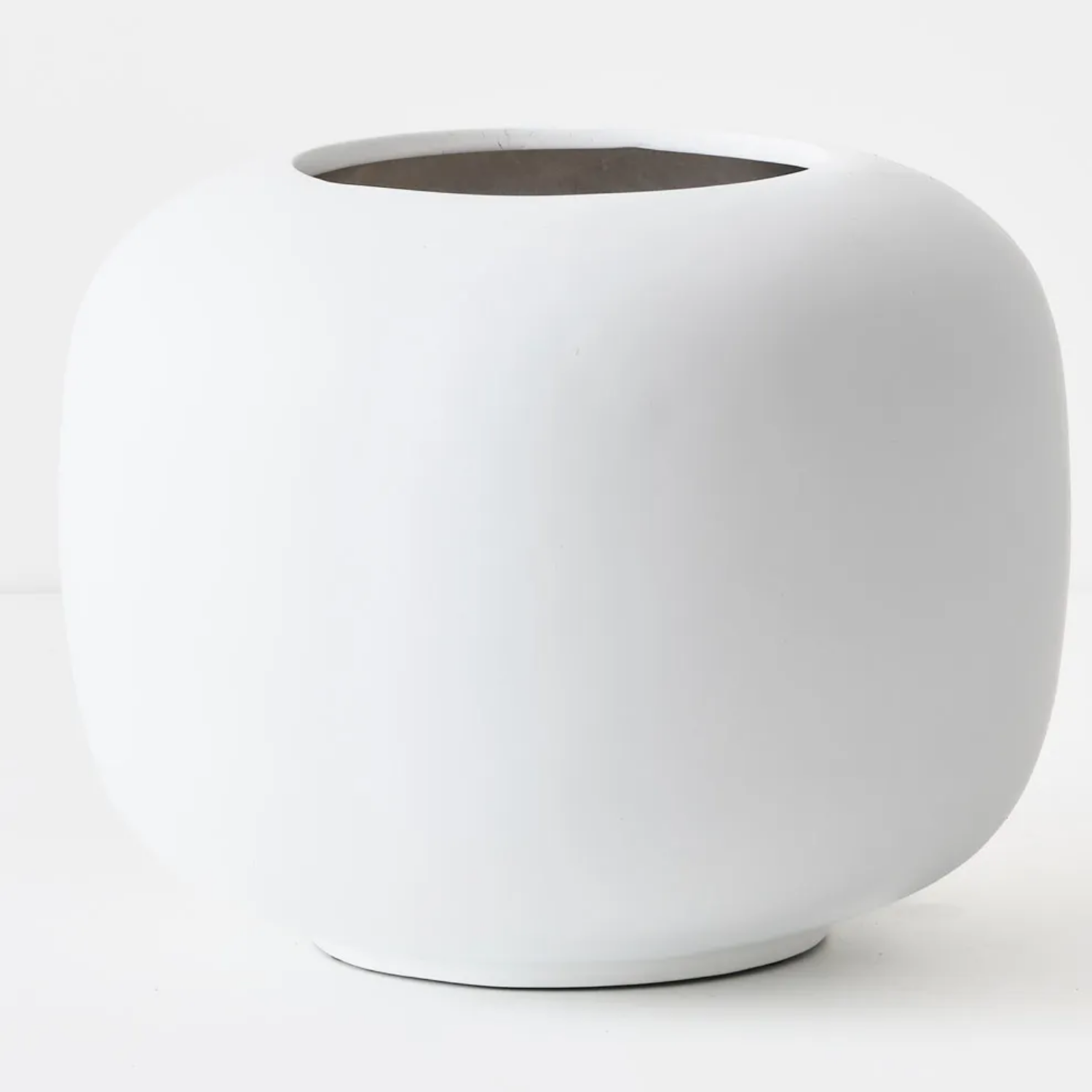 White spherical planter on a white background