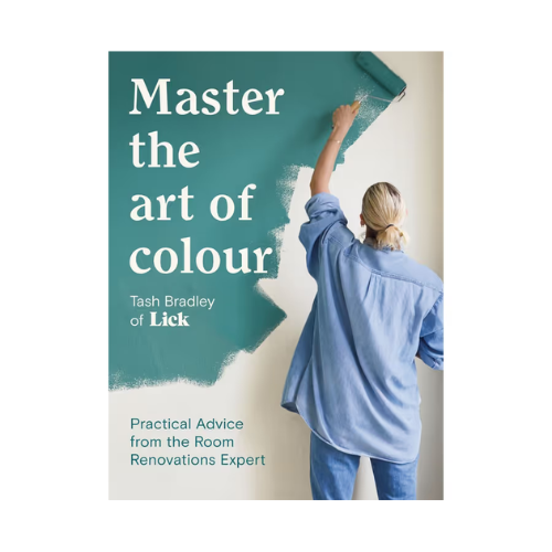 Book cover with text 'Master the art of colour' and a person painting a wall.