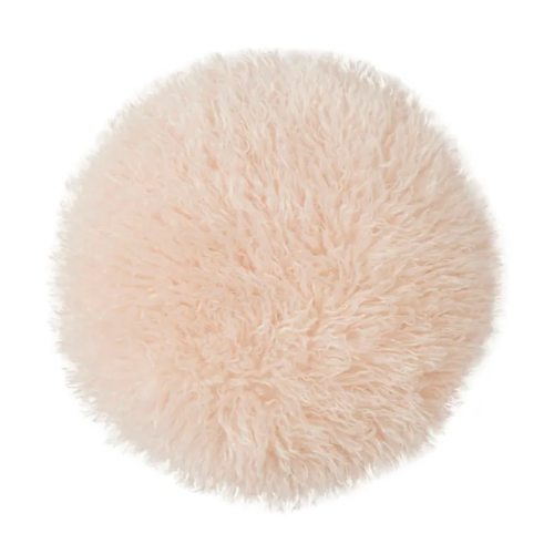Faux fur rose coloured round cushion on a white background