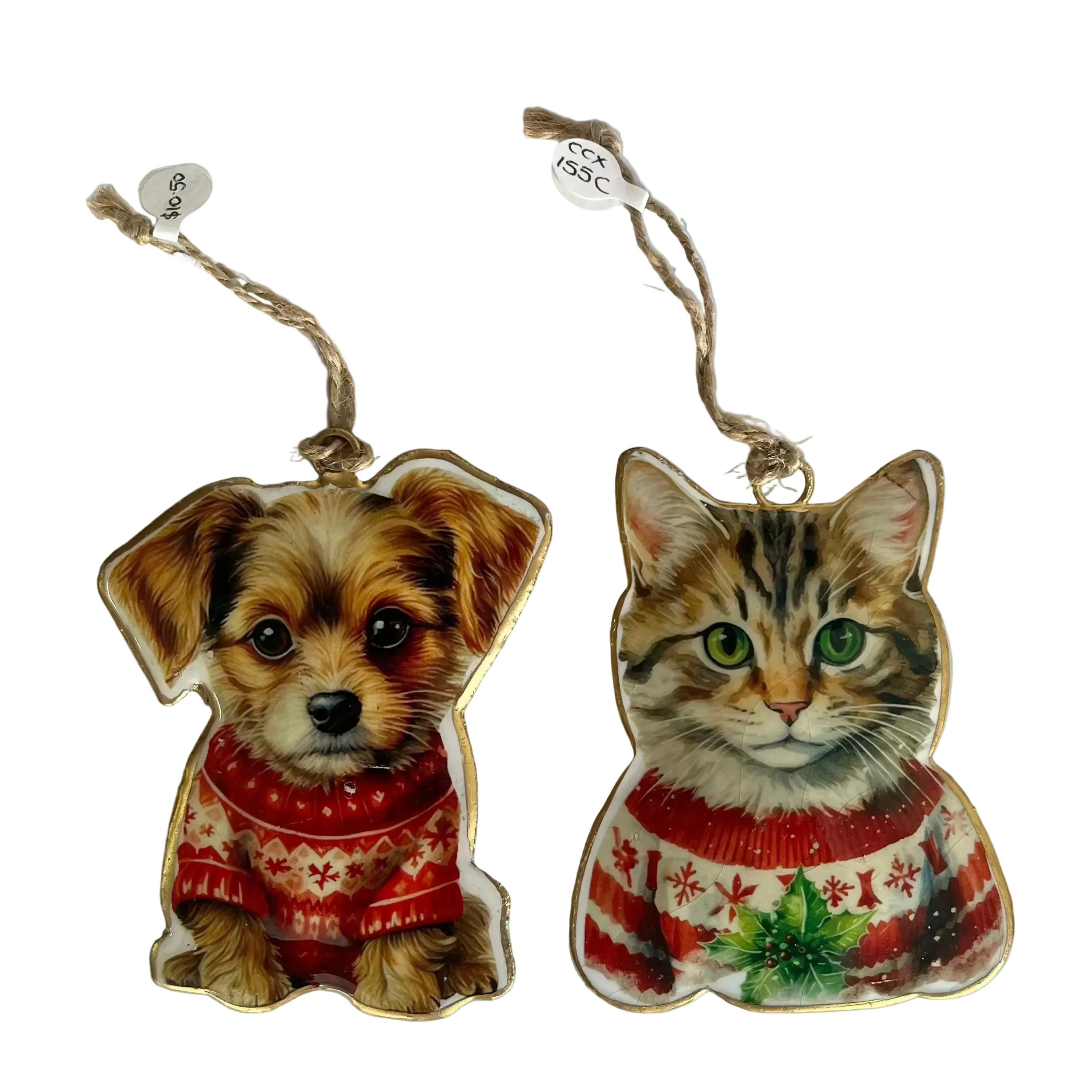 Two Christmas ornaments shaped like a dog and a cat, both wearing red knit sweaters, displayed on a light gray background.