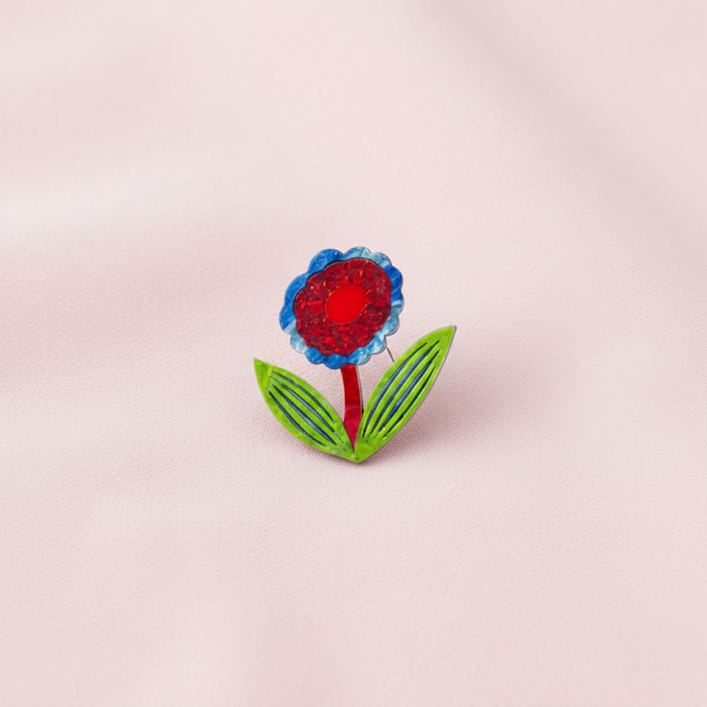 Colourful flower brooch on a white background