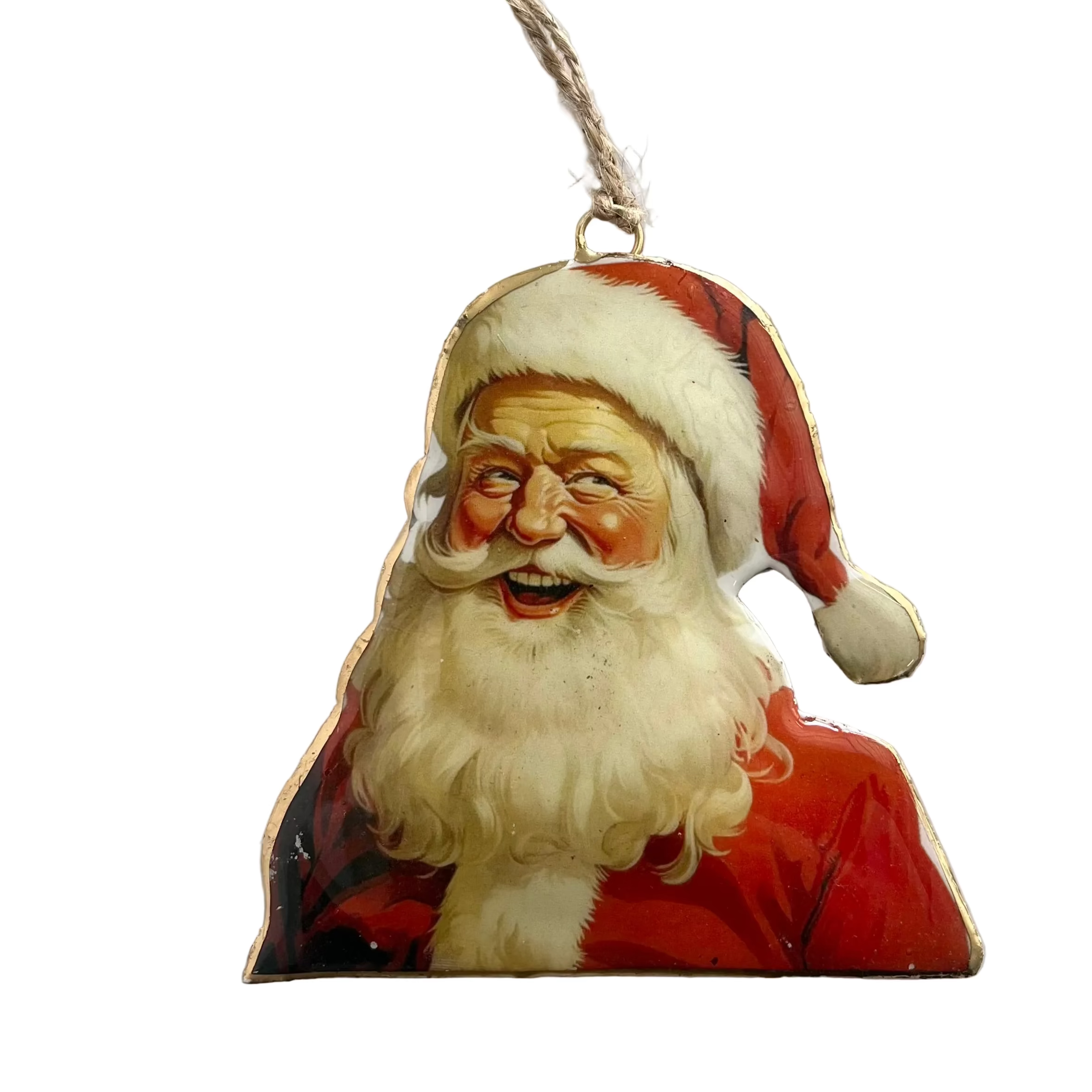 A vintage-style Christmas ornament shaped like a smiling Santa Claus portrait, with a red suit, white beard and hat trim, hanging from a natural jute string on a white background.