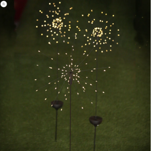 Starburst Outdoor Solar Powered Light on grass