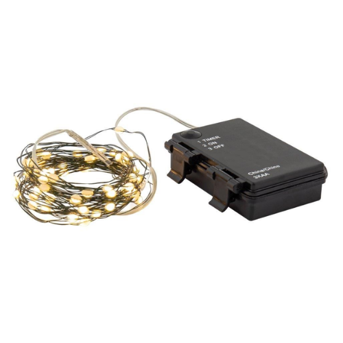 String lights with a black power adapter on a white background