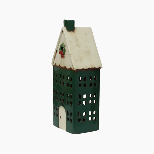 Ceramic house-shaped tealight house with a green base and white roof on a white background