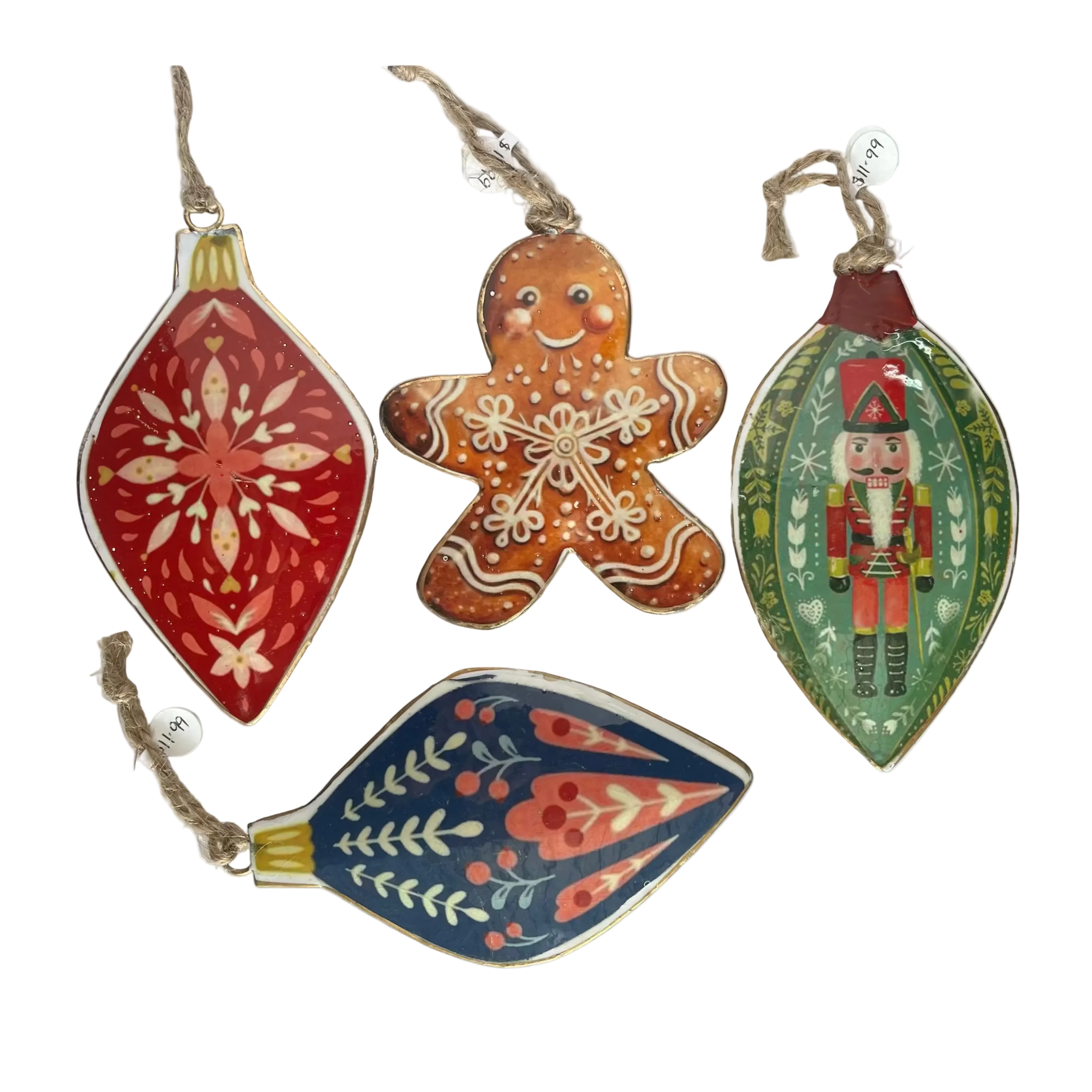 Four hand-painted Christmas ornaments in red, gingerbread brown, green, and navy blue, decorated with traditional festive patterns and hanging from twine on a white background.
