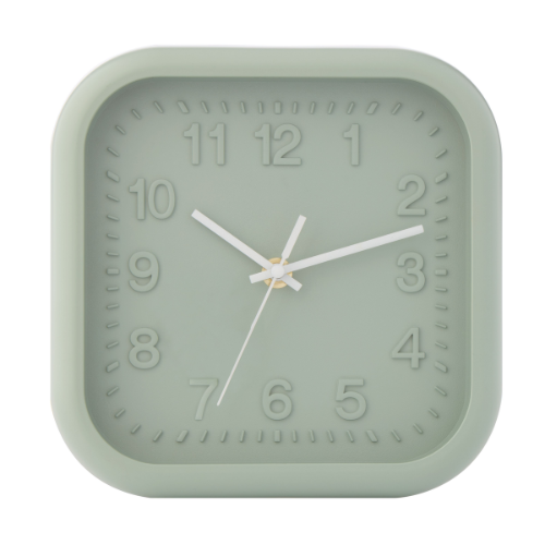 Square sage green wall clock with white hands on a white background